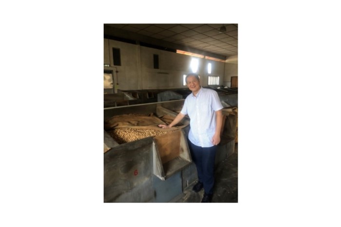 <span>This photograph of James Lee, son of founder Lee Chit Heng, was taken at the family’s roasted peanuts factory in Malaysia, where Farmer Brand products are still manufactured today. </span>